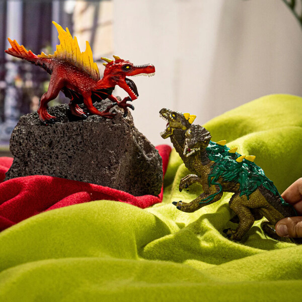 Schleich Fire Saurian vs. Jung